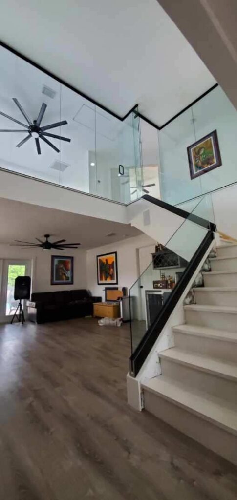 Orlando custom cut glass walls doors stair railings home builder Celebration Florida